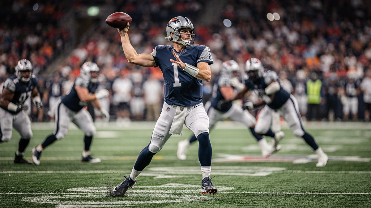 Quarterback wirft einen Pass während eines NFL-Spiels auf dem Footballfeld